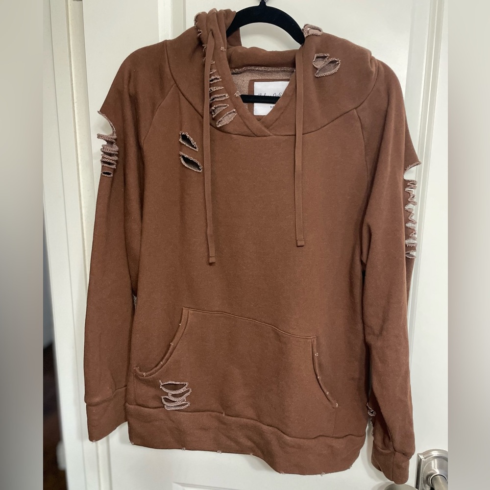 Distressed hoodie by Chelsea DeBoer